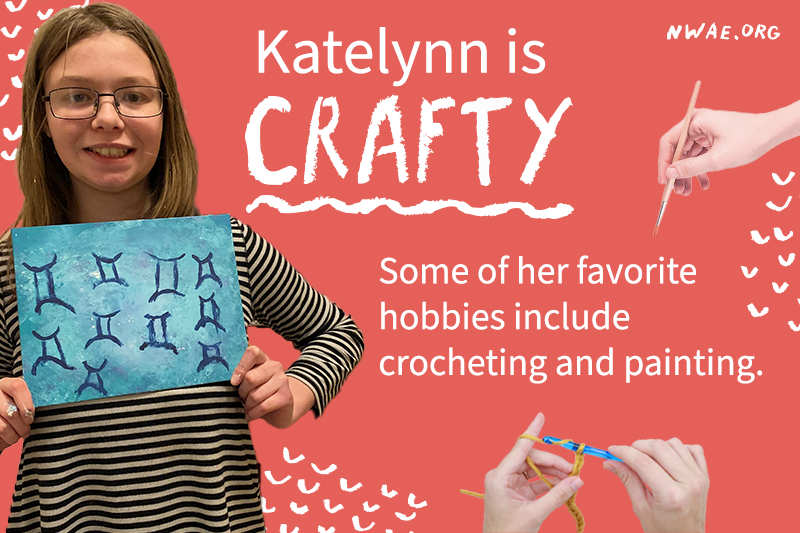 Katelynn smiling and holding up a blue painting she made. She loves painting and crocheting.