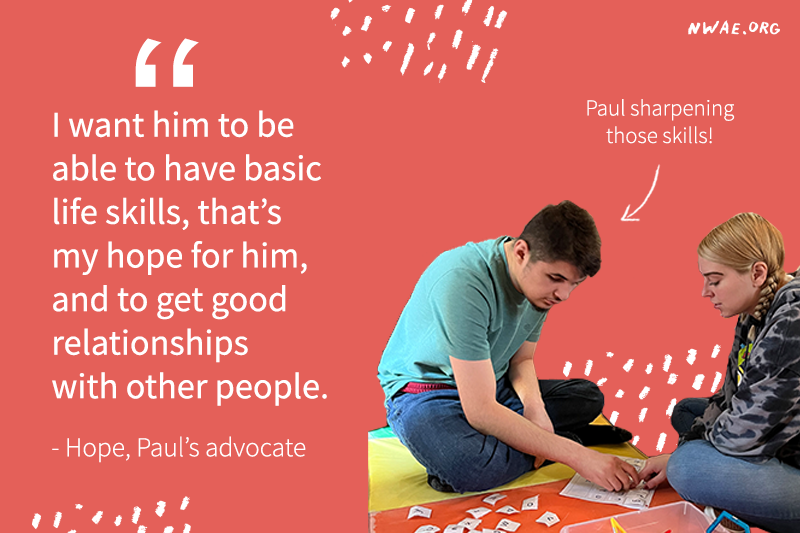 Paul doing a matching game with his advocate Hope. She wants him to have basic life skills and hopes that he gets good relationships with other people as he grows up.
